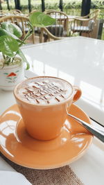 High angle view of hot chocolate in cup on table