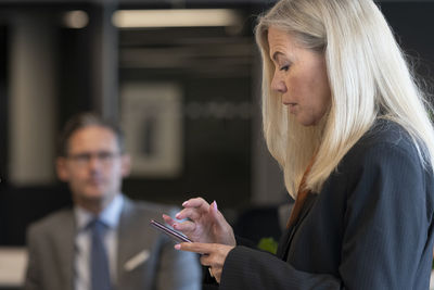 Young woman using mobile phone