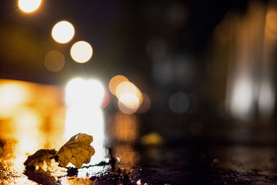 Close-up of illuminated lights at night