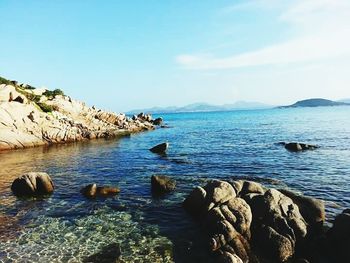 Scenic view of sea against blue sky