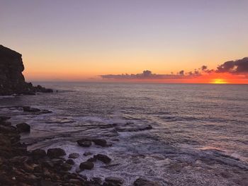 Scenic view of sea against sky during sunset