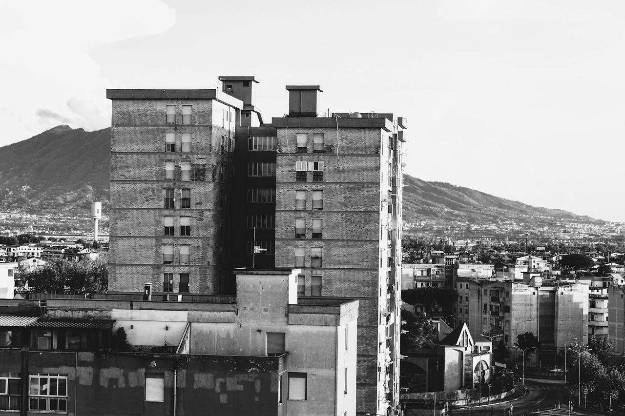 RESIDENTIAL BUILDINGS AGAINST SKY IN TOWN