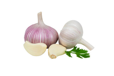 Close-up of garlic against white background