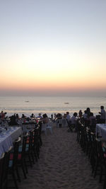 Scenic view of beach against sky during sunset