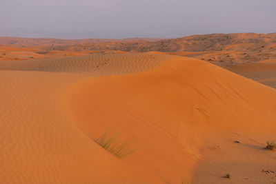 Scenic view of desert against sky