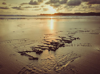 Scenic view of sea at sunset