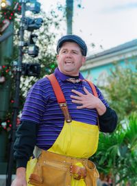 Portrait of smiling man standing outdoors