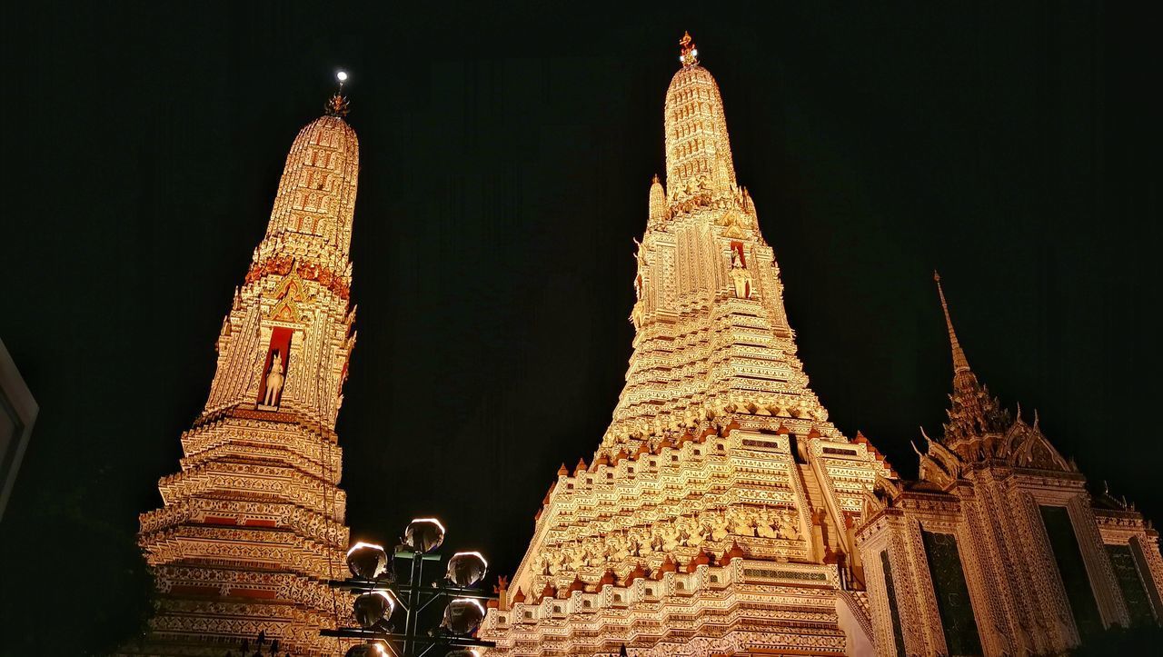 LOW ANGLE VIEW OF TEMPLE AGAINST BUILDING