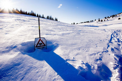 Snow covered mountain against sky