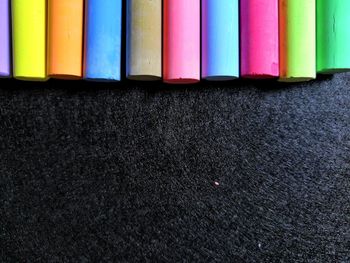 High angle view of multi colored pencils on table