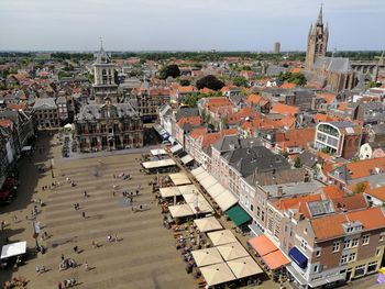 Aerial view of delft, in the netherlands, with the market square and the old church. 