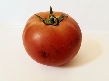 Close-up of apple against white background