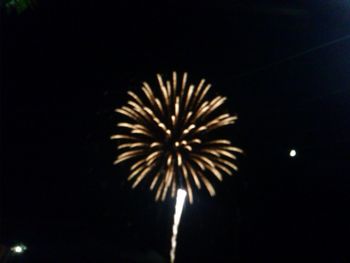 Low angle view of firework display