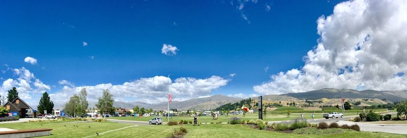 Panoramic view of landscape against cloudy sky