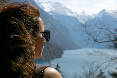 Close-up of woman wearing sunglasses looking away