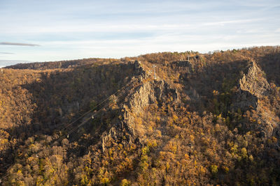 High angle view of trees and mountains against sky