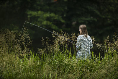 View of man fishing