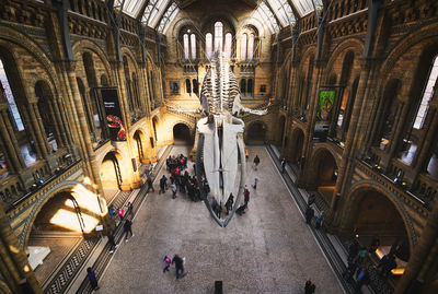 Group of people walking in building