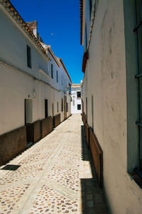 Narrow alley along buildings