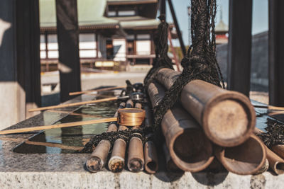 Close-up of old objects on table