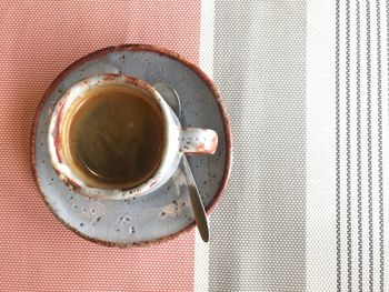 High angle view of coffee cup on table