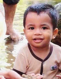 Close-up portrait of smiling boy