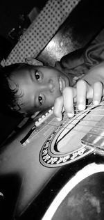 Portrait of boy playing piano