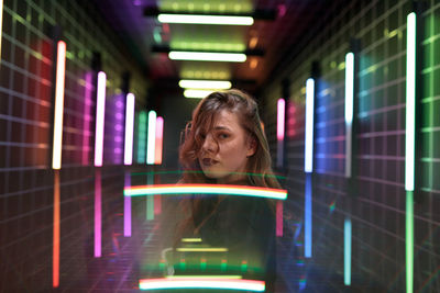 Portrait of young woman looking away