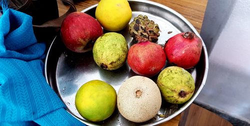 High angle view of fruits in bowl on table