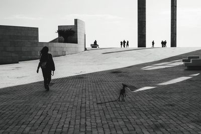 Woman standing in city