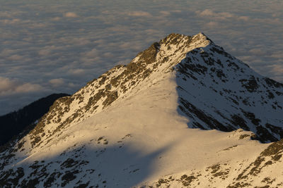 Scenic view of snowcapped mountains against sky, fagaras mountains