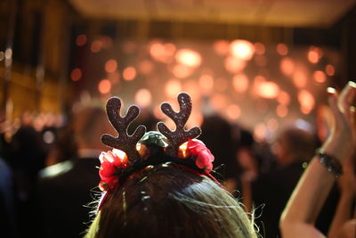 Close-up of woman wearing headband at party