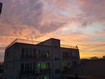 Building against sky during sunset