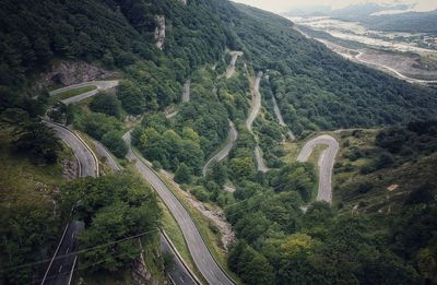 High angle view of road amidst mountains