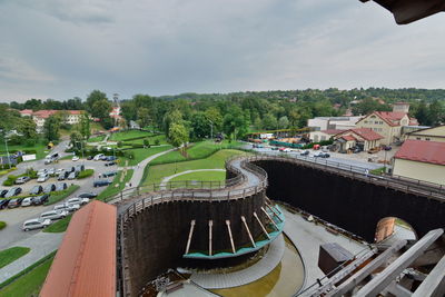 High angle view of buildings and trees against sky