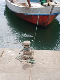 High angle view of boat moored at harbor