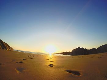 Scenic view of sea at sunset