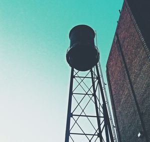 Low angle view of built structure against clear blue sky