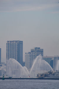 Low angle view of cityscape against sky