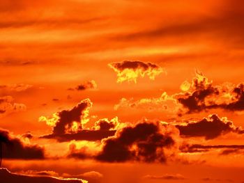 Low angle view of clouds in sky during sunset