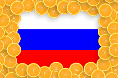 Digital composite image of orange fruit against blue background