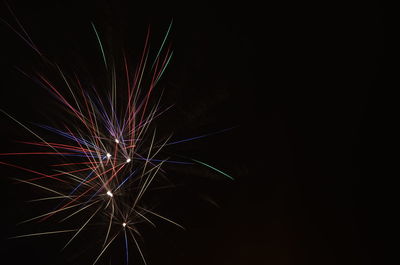 Firework display at night