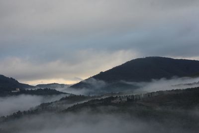 Scenic view of mountains against sky during sunset