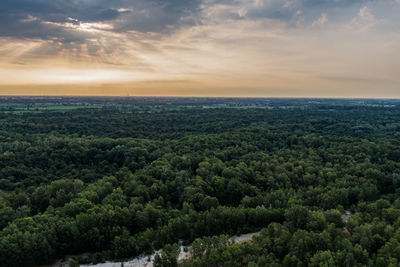 Scenic view of landscape against sky during sunset