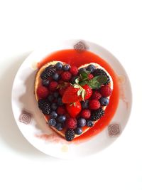 High angle view of strawberries in plate