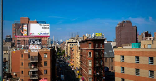 Buildings in city against sky