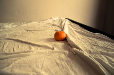 Close-up of eggs on bed at home