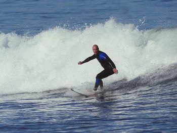 Man surfing in sea