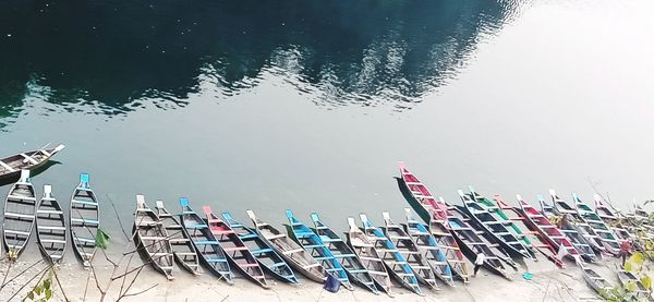 High angle view of boats moored in lake