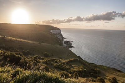 Scenic view of sea against sky during sunset